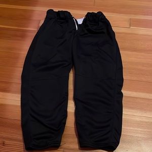 Black softball pants. Adult small. Worn a little.